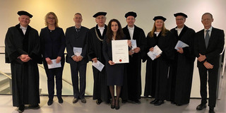 Group photo: Myroslava Hladchenko and the doctoral committee after the successful defense of her doctoral thesis